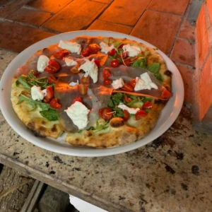 Pizza pomodorini rucola prosciutto e mozzarella Crema e Cioccolato