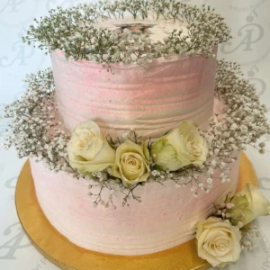 Torta con rose e fiorellini colore rosa di Antonio Palmieri Pasticceria